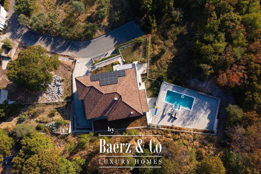 Kostrena, a house with a swimming pool and a stunning open sea view image