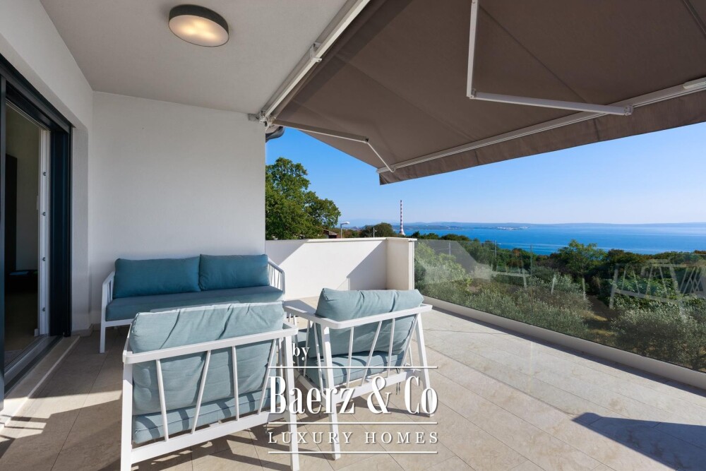 Kostrena, a house with a swimming pool and a stunning open sea view image