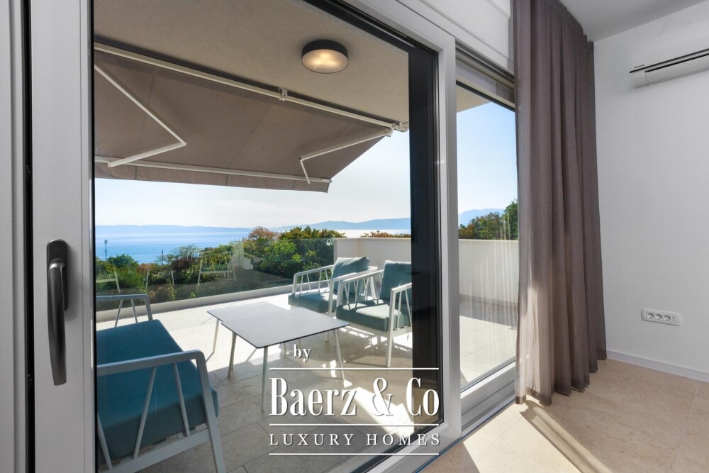 Kostrena, a house with a swimming pool and a stunning open sea view image