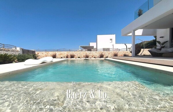 photo 3 EXCLUSIVE LUXURY VILLA ON THE FIRST LINE OF THE SEA IN CIUTADELLA, MENORCA, WITH SWIMMING POOL AND MODERN DESIGN