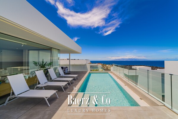 photo 1 Newly built beachfront villa in a residential area.