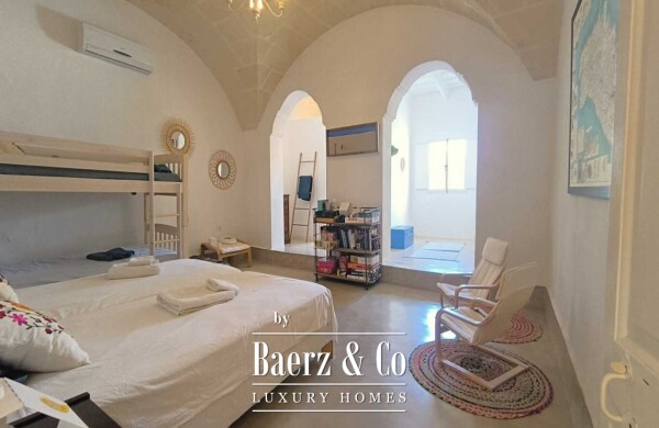 photo 11 RENOVATED MENORCAN HOUSE FOR SALE IN THE HISTORIC OLD TOWN OF CIUTADELLA, MENORCA – COURTYARD WITH SWIMMING POOL, 4 EN-SUITE BEDROOMS AND ORIGINAL ARCHITECTURAL FEATURES