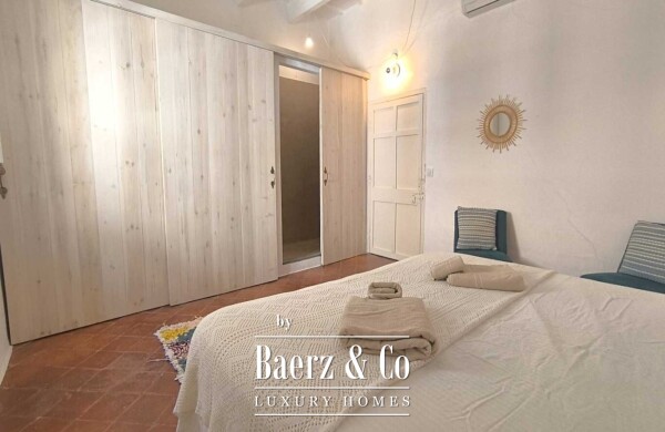 photo 16 RENOVATED MENORCAN HOUSE FOR SALE IN THE HISTORIC OLD TOWN OF CIUTADELLA, MENORCA – COURTYARD WITH SWIMMING POOL, 4 EN-SUITE BEDROOMS AND ORIGINAL ARCHITECTURAL FEATURES